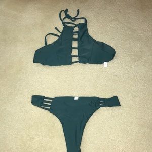 Green cross bathing suit